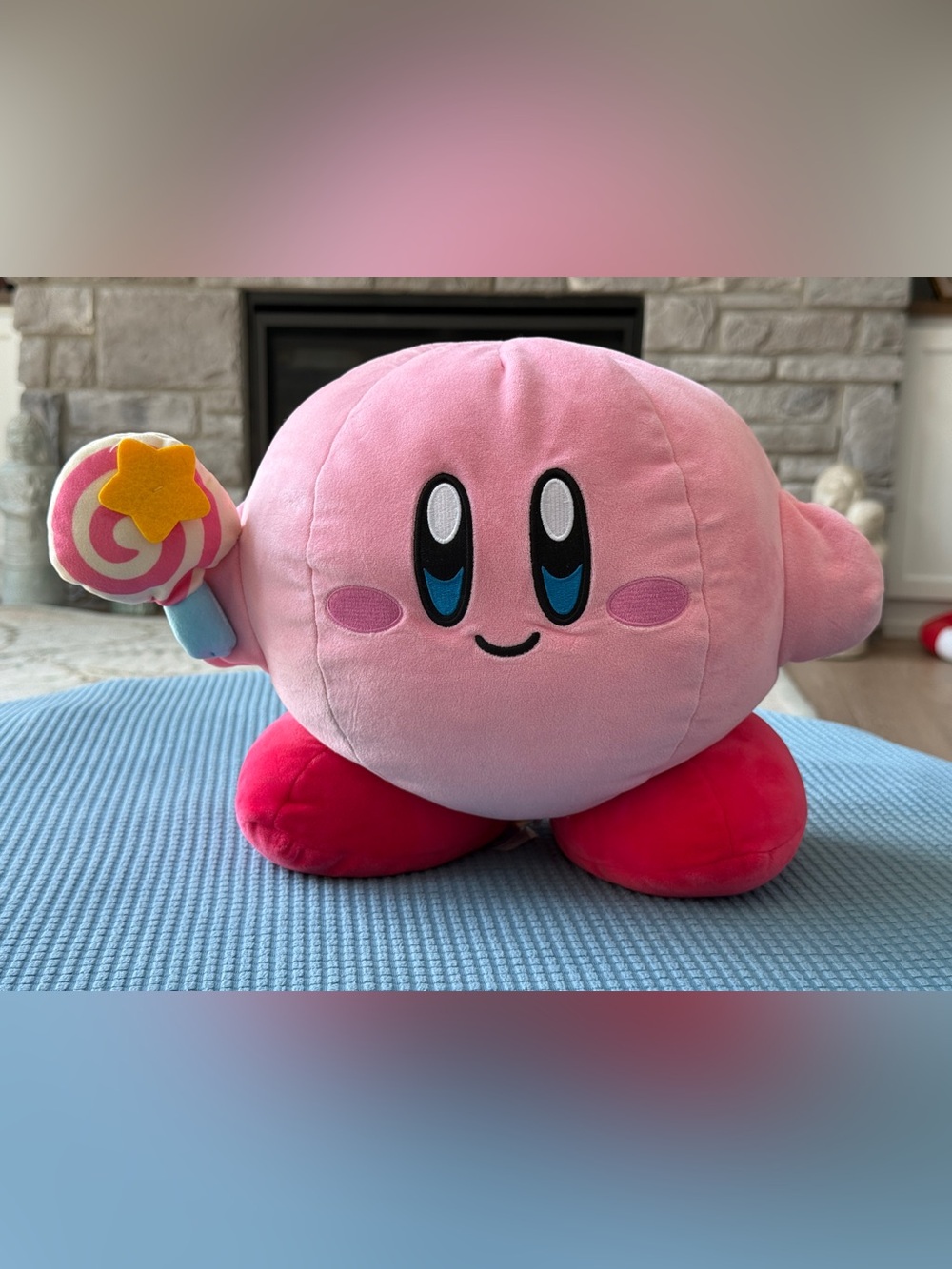 Club Mocchi Kirby plush with lollipop is cute and soft with some weight to it.